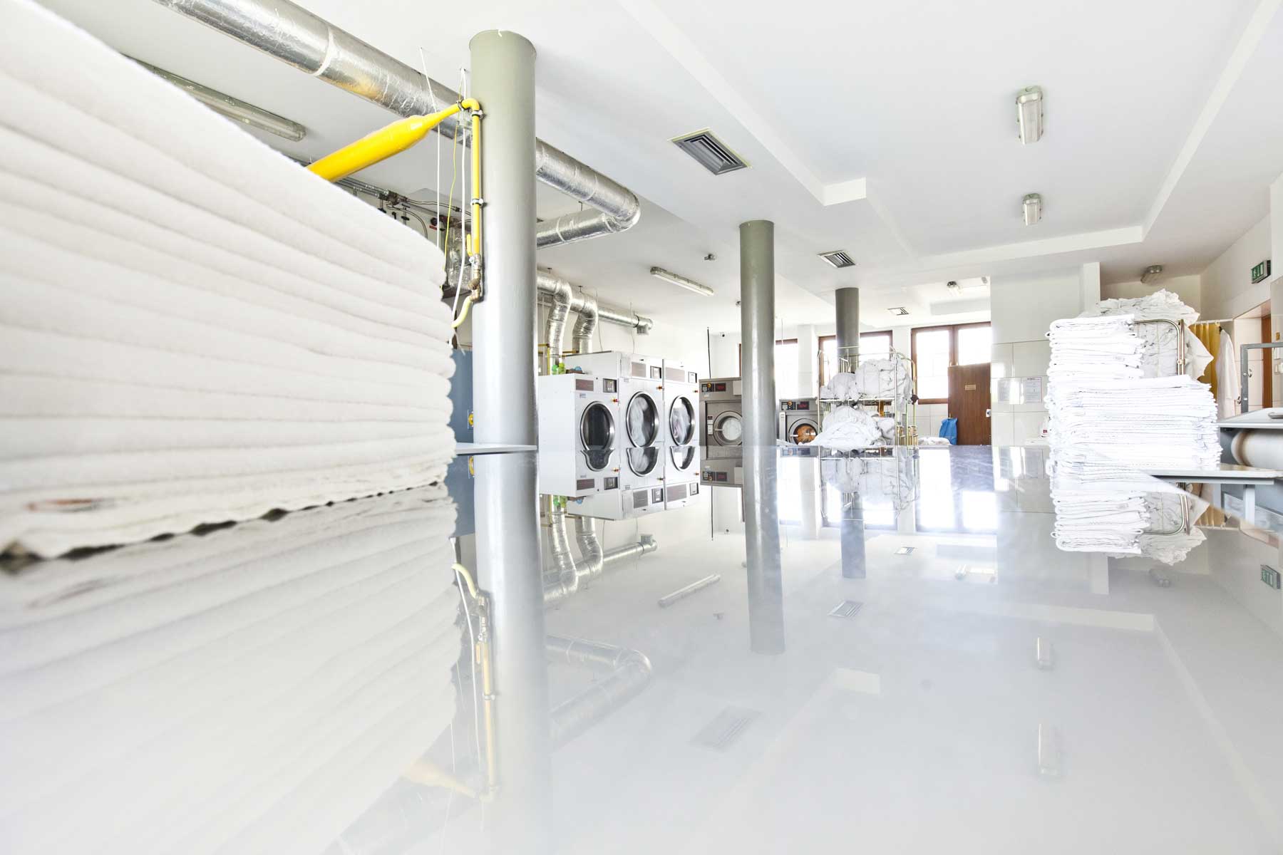 Professionelle Desinfektion & Reinigung der Wäscherei-Lüftung